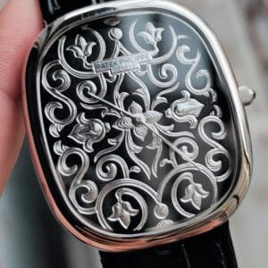 Patek Philippe Ref. 5738/51G-001 Golden Ellipse Watch hand-engraved black enameled dial